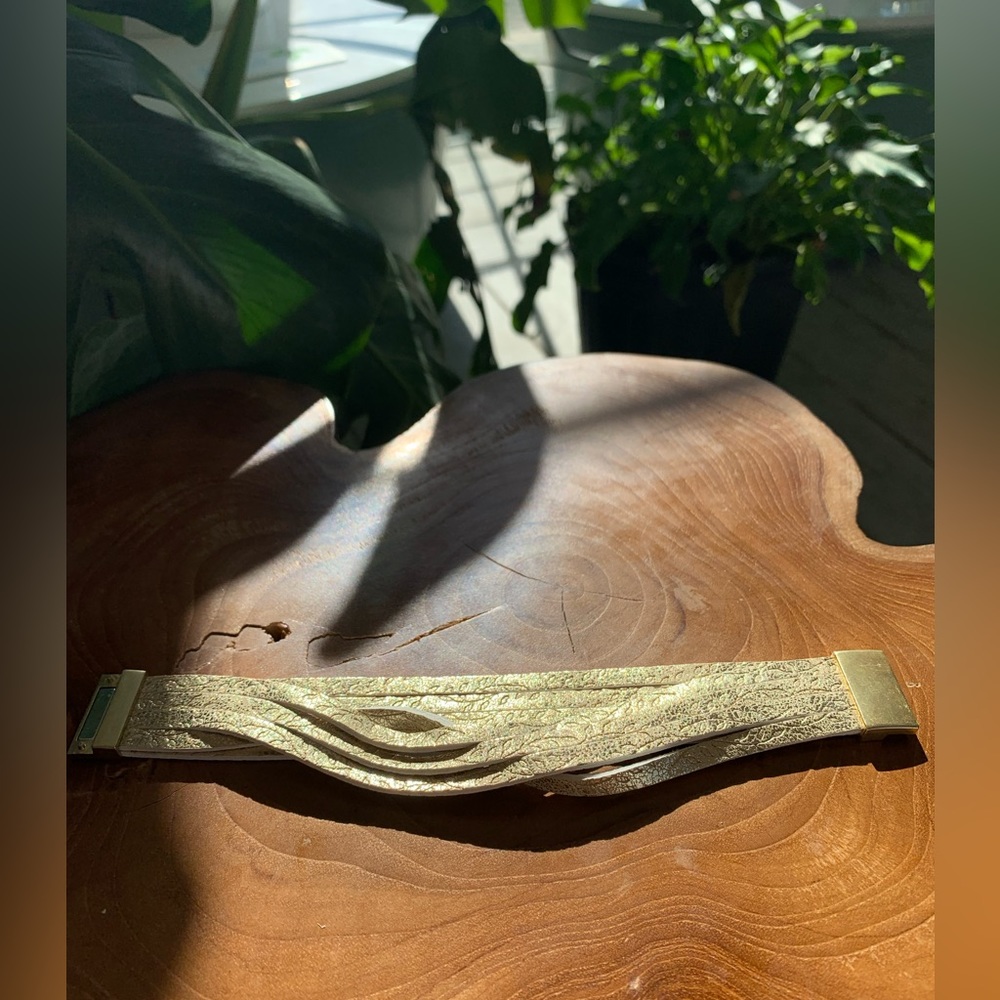 Gold pleather band leaf design bracelet